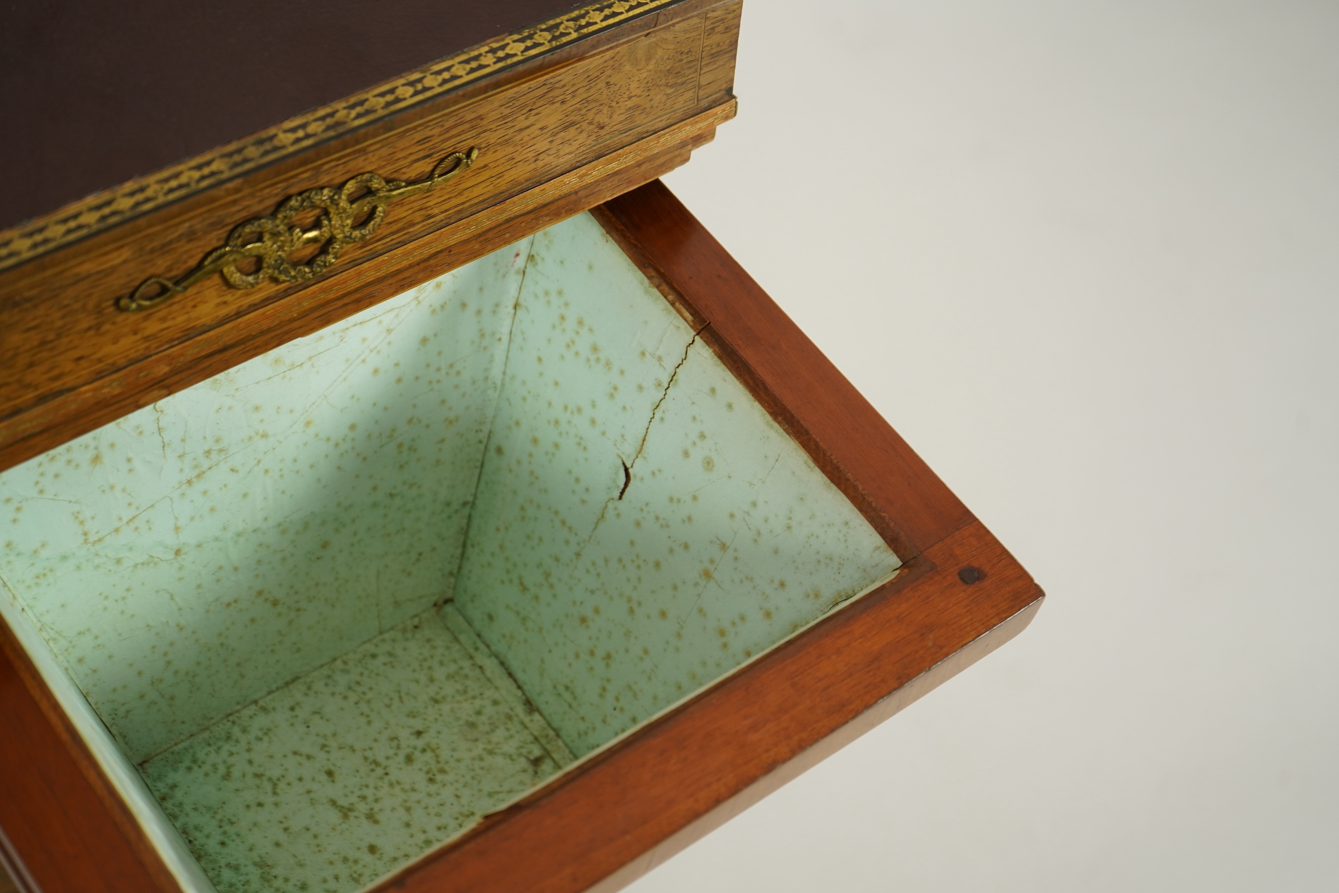A Regency brass mounted rosewood writing, games and work table